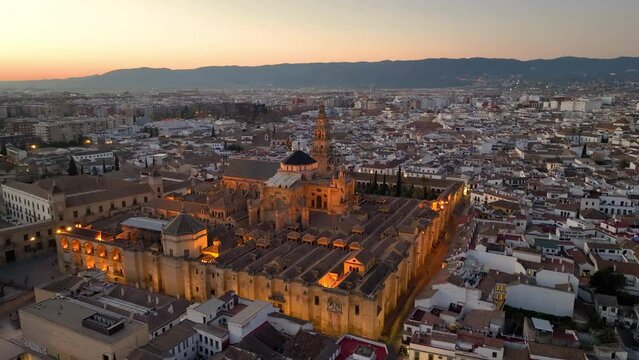 Aerial view of the Alcazar of Cordoba, Spain. Flying over Mosque-Cathedral in Cordoba at night, Spain