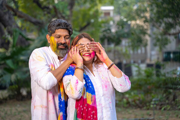Fototapeta premium Indian people celebrate holi festival together at park.