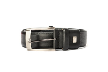 The photo of a leather black belt on a white background
