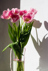 Bouquet of pink tulips, top view, spring bouquet.