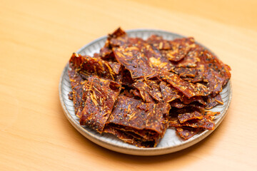 Pile of sliced crispy pork jerky
