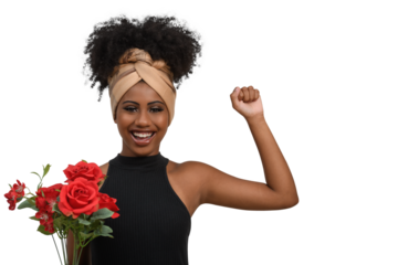 woman with raised fist, smiling, holding flowers 