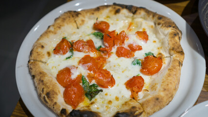 A delicious Napoli-style pizza baked in an gas oven.