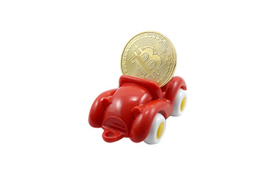 red paint plastic toy car carrying bitcoin gold coins  isolated on transparent background.