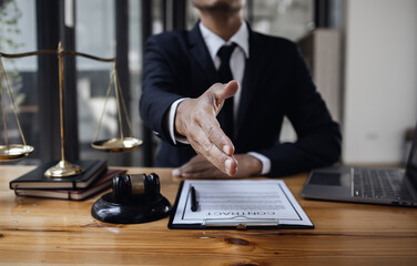 lawyer working with contract agreement at table office, law and justice concept, Selective focus.