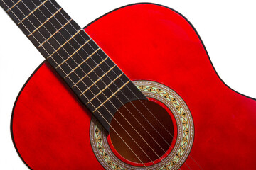 Close-up. A part of a red acoustic guitar  A part of a red acoustic guitar on white background