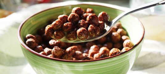 Chocolate balls cereals. Tasty breakfast 