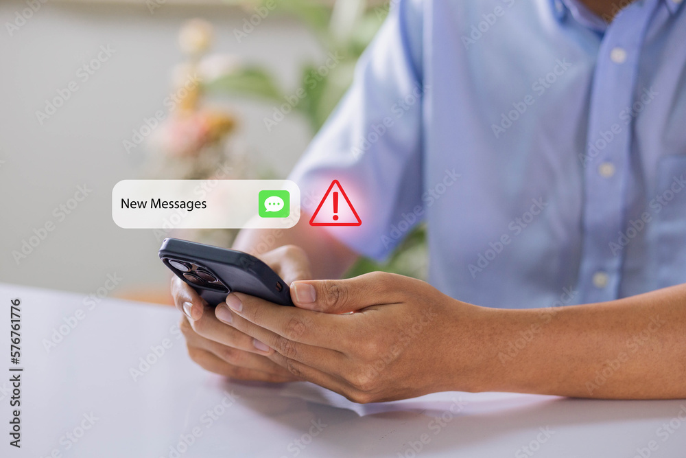 Leinwandbilder businessman using smartphone with new message electronic email hacking and spam warning symbol. cybe