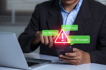 Businessman using smartphone with new message electronic email hacking and spam warning symbol. cyber attack network, virus, spyware, Cyber security and cybercrime.