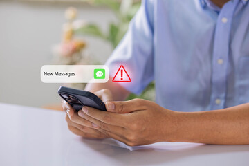 Businessman using smartphone with new message electronic email hacking and spam warning symbol. cyber attack network, virus, spyware, Cyber security and cybercrime.