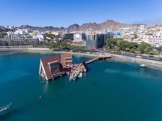 The city of Mindelo, located on the island of S&atilde;o Vicente in Cabo Verde, is a place of vibrant landscapes. It boasts colorful streets, a bustling port, a lively cultural center with music, dance...