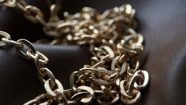 Gold Chain On Leather Slider Shot