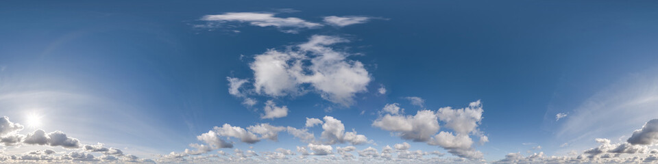 blue sky with cumulus clouds as seamless hdri 360 panorama with zenith in spherical equirectangular projection may use for sky dome replacement in 3d graphics or game development and edit drone shot