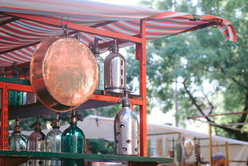 Old vessel and bottles in a antiques fair