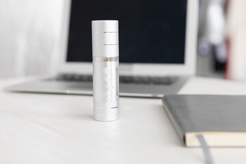 Empty metallic pump cream bottle. Mockup bottle concept, copy space