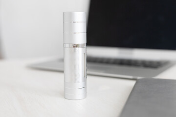 Empty metallic pump cream bottle. Mockup bottle concept, copy space