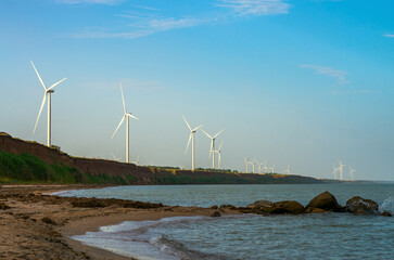 Wind farms on a steep seashore
