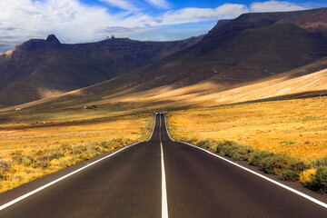 Travel in Canary islands. Impressive landscapes of volcanic Lanzarote . scenic road lead to Famara beach
