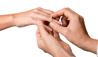 Close up Groom Putting the Wedding Ring on bride's finger