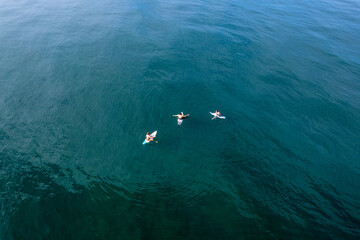 Beautiful aerial view of people surfing in Hermosa Beach - Costa Rica