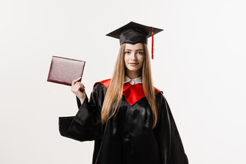 Student with diploma in graduation robe and cap ready to finish college. Future leader of science. Academician young woman in black gown smiling.