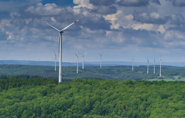 Beautiful forest landscape with wind turbines in saarland germany europe