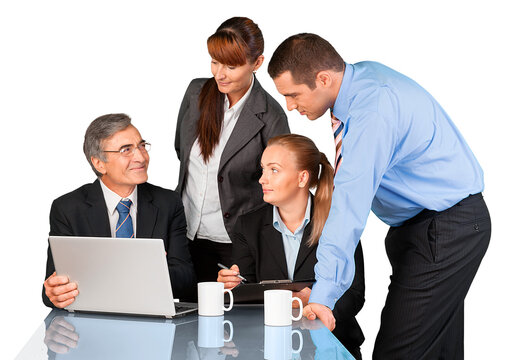 Group Of Businesspeople Talking Near The Table With Laptop And Cups, Isolated On White