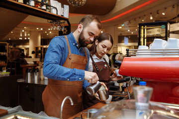 Making coffee in a coffee shop on a coffee machine