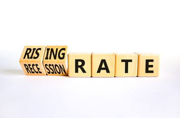 Recession or rising rate symbol. Concept word Recession rate Rising rate on wooden cubes. Beautiful white table white background. Business recession or rising rate concept. Copy space.