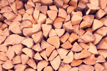 Background with old wooden boards, harvested firewood.