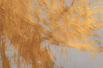 Art oil and acrylic smear blot canvas painting wall. Abstract texture gold and beige color stain brushstroke texture background.
