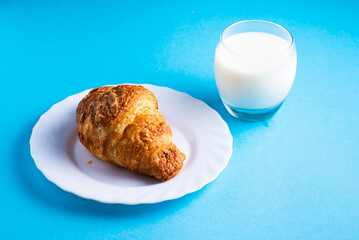 Wheat bread breakfast and milk in morning, croissant, plate