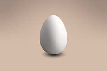 White egg on a light brown floor