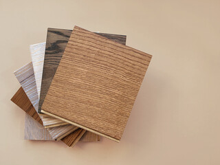 Engineered hardwood or laminate flooring swatch samples in various type of wood texture, isolated...