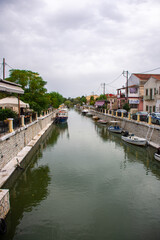 Fototapeta na wymiar Bridge over water canal in Lefkimmi, small town on Corfu - Kerkyra Island