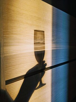 shadow of a glass of wine