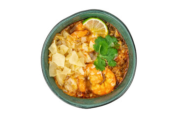 Tom Yam Kung soup with shrimps in ceramic green bowl isolated on white