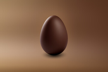 milk chocolate Easter egg on a brown floor