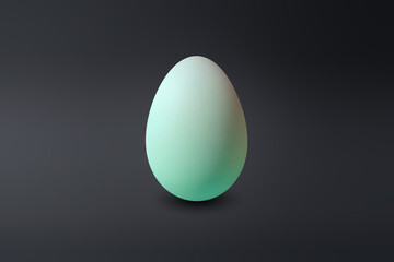 green Egg on a dark floor