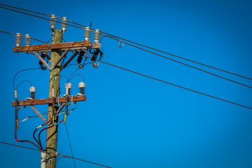 Electrical distribution lines from the power plant to the home customer
