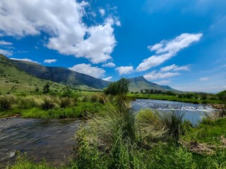 Fototapeta na wymiar River by Beautiful mountains 