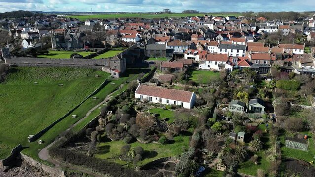 Crail, a historic fishing village on the east coast of Scotland in the East Neuk of Fife. Low level aerial footage of the pretty little harbour. 