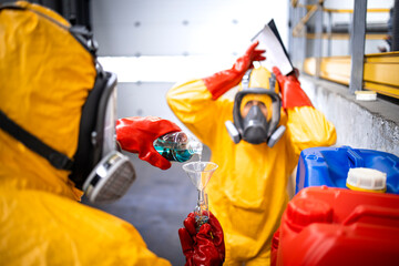 Factory worker mixing wrong chemicals. Risk and danger at job.