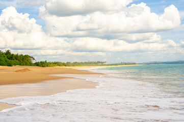 Beautiful tropical landscape. Sandy ocean shore. Beautiful texture background for tourism, design...
