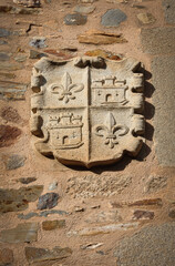 Monumental city of Caceres, old heraldic shield, Extremadura, Spain