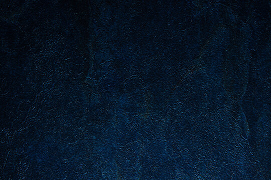 dark blue textured background, copy space