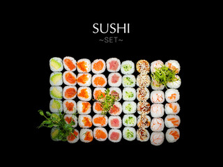 Set of different types of Maki sushi rolls. A lot of sushi isolated on black background with text and copy space. Ready square restaurant menu banner. Assortment of Futomaki rolls with greens on top