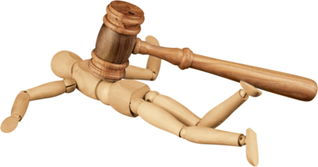 Miniature wooden mannequin with a gavel hitting it in the back