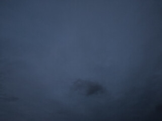 Nightfall, greyish indigo. Difuminated clouds of these colours