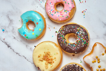 several different donuts on a white background